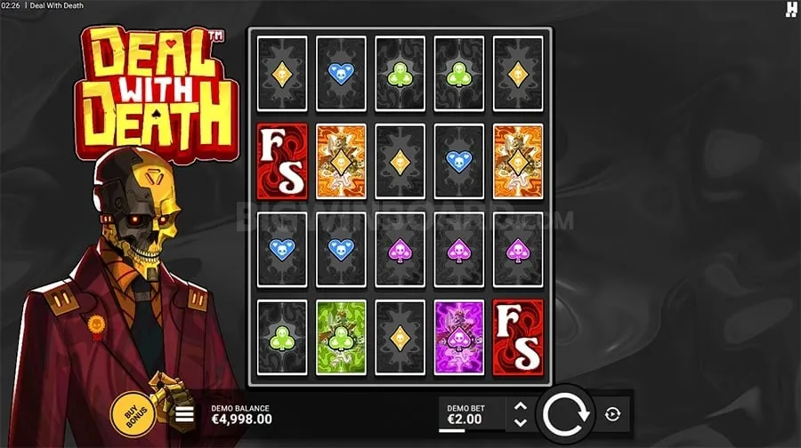 Player strategizing on a laptop with OKBET games in the background